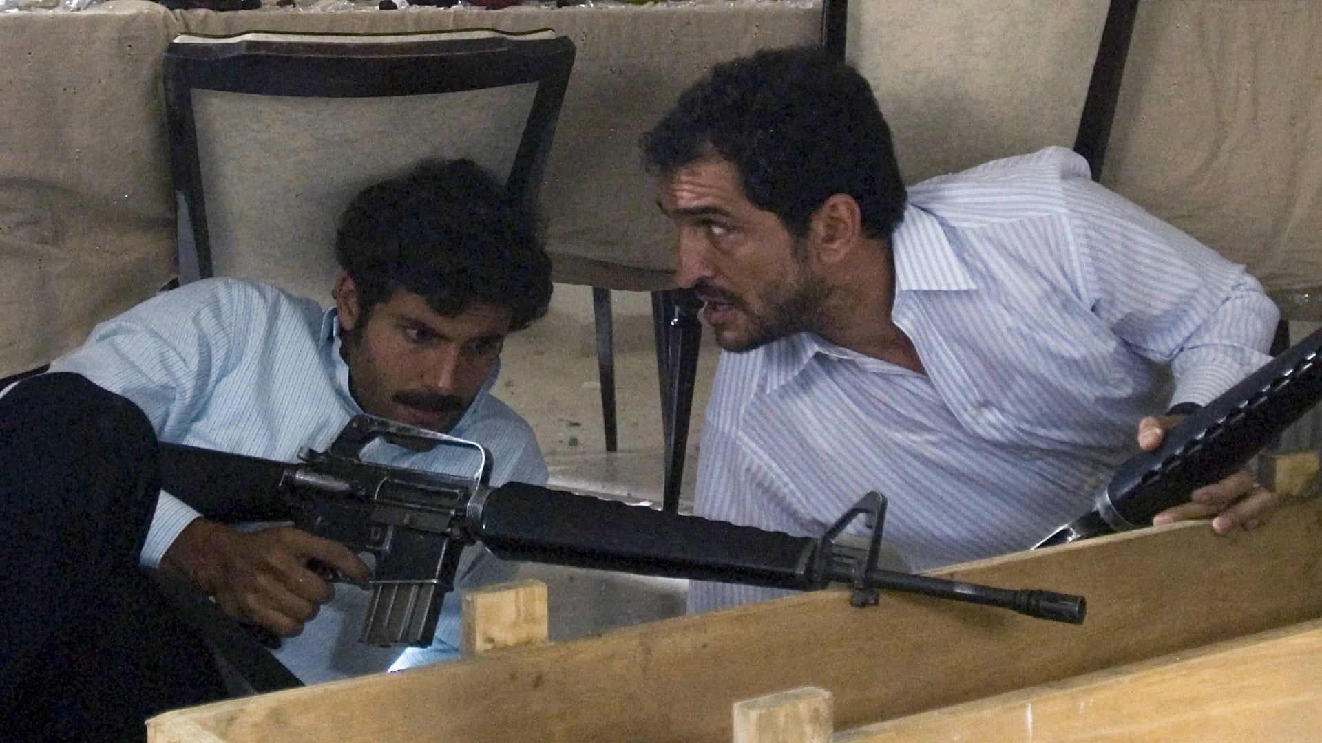 House of Saddam background