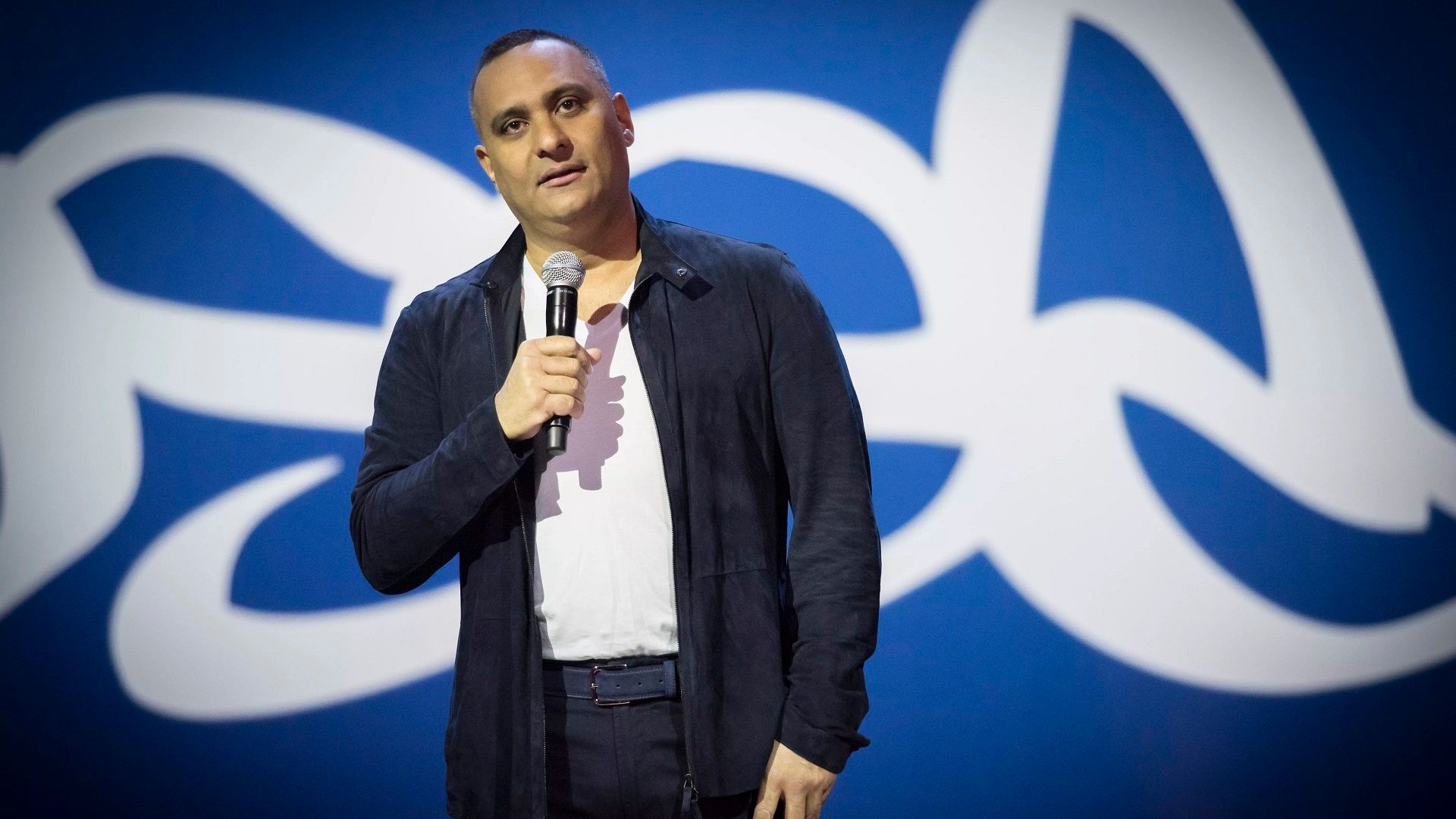 Russell Peters: Almost Famous background