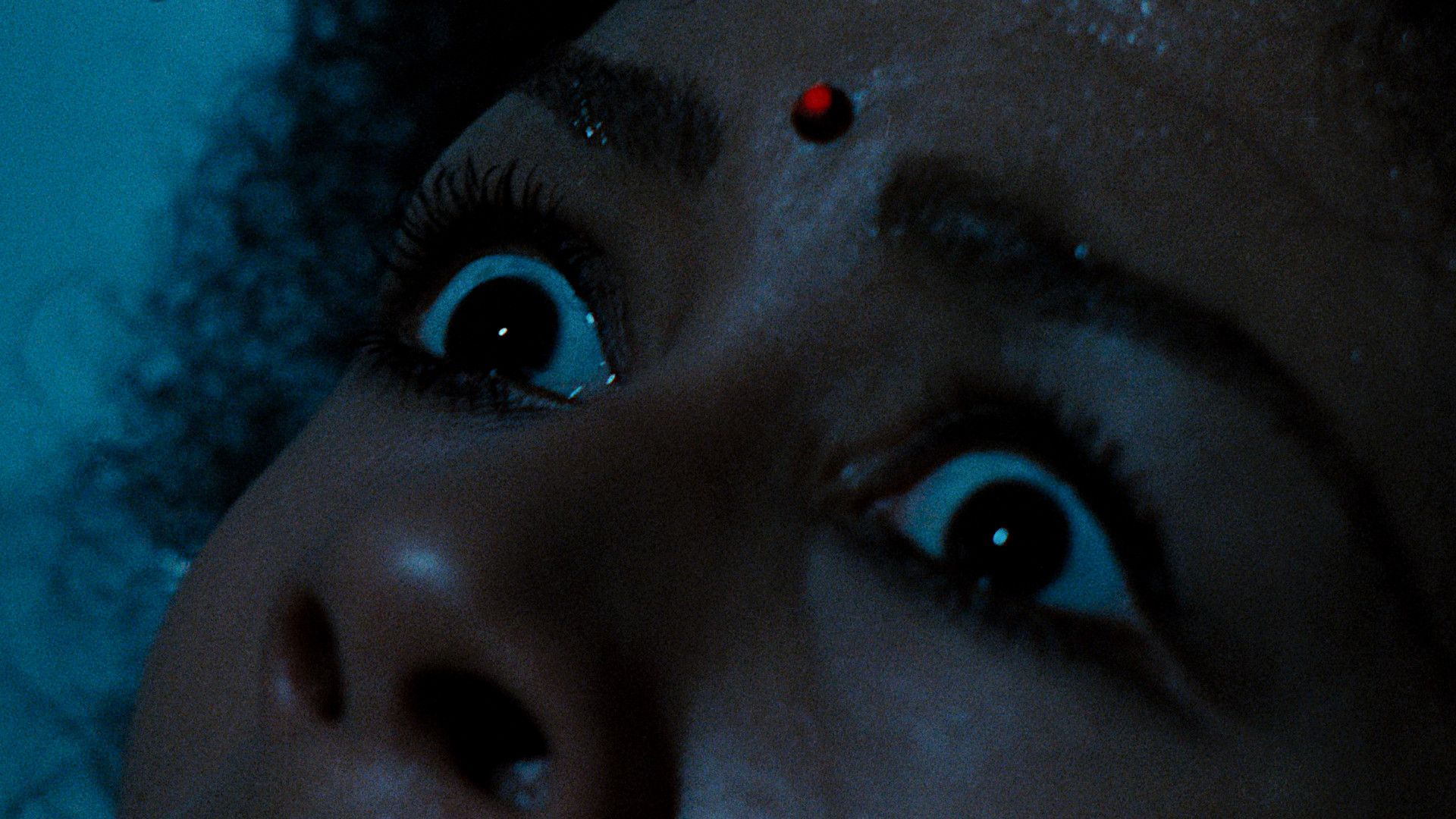 What Are Those Strange Drops of Blood Doing on Jennifer's Body? background