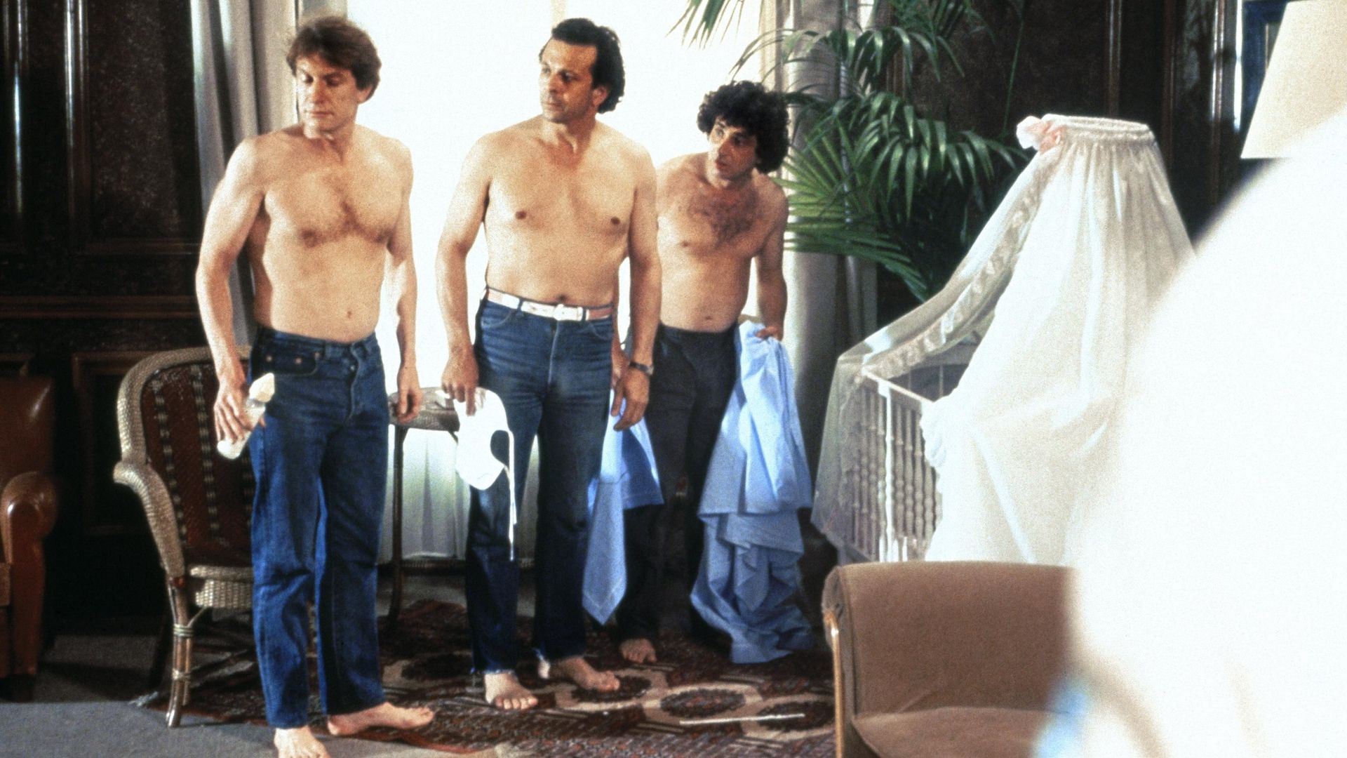 Three Men and a Cradle background