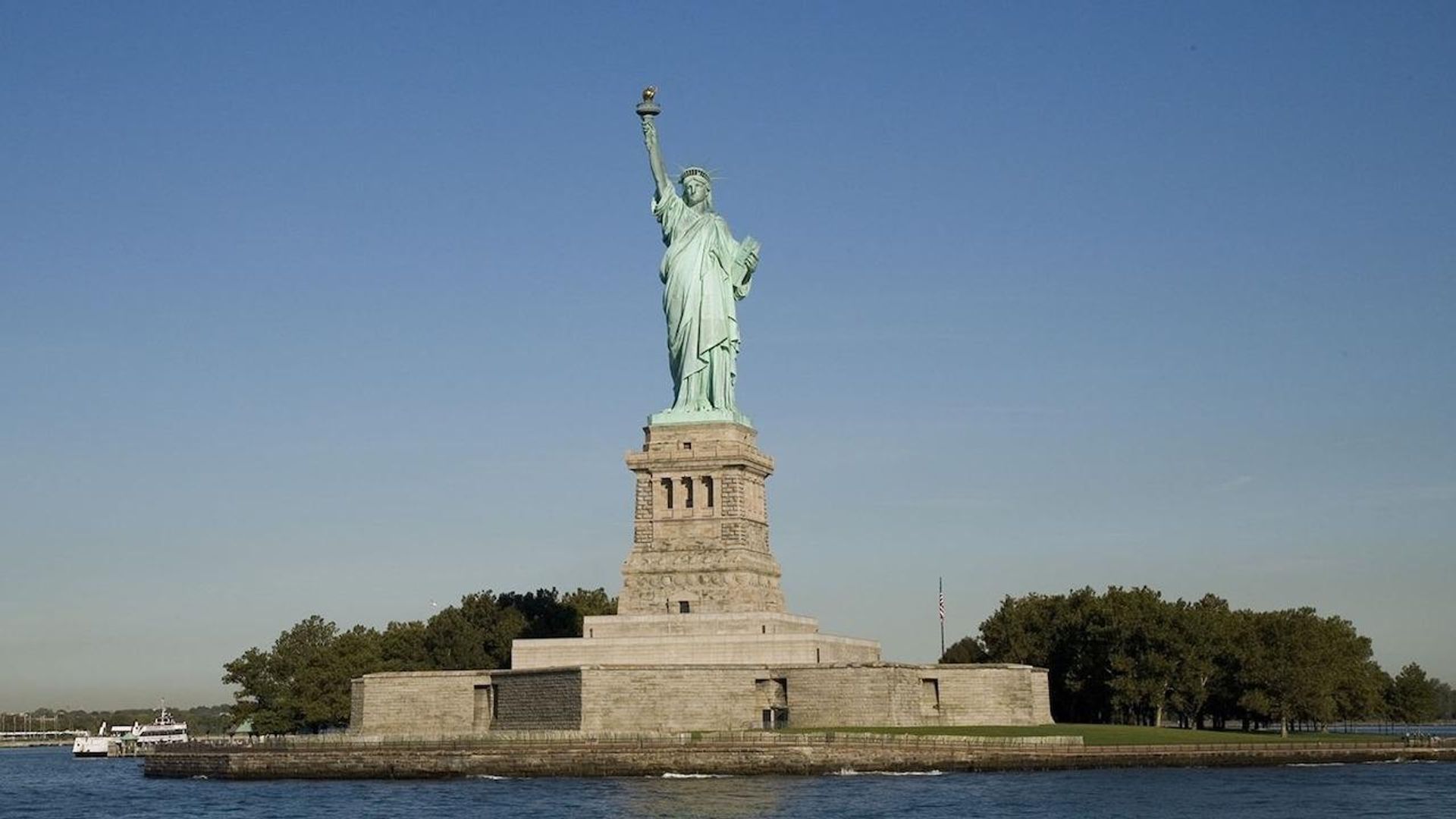 Lady by the Sea: The Statue of Liberty background