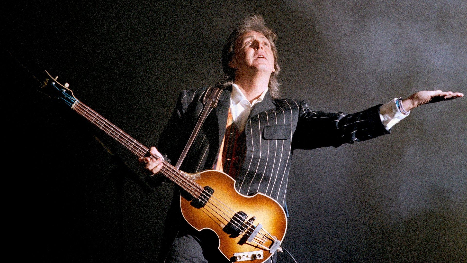 Paul is Live in Concert on the New World Tour background