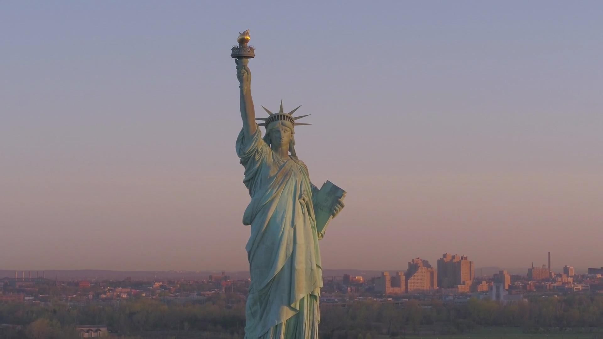 Liberty: Mother of Exiles background