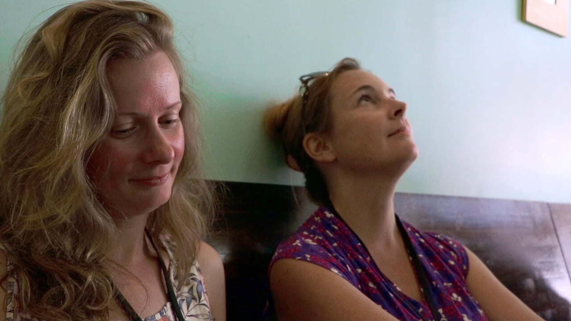 Two Straight Girls at a Queer Fest background
