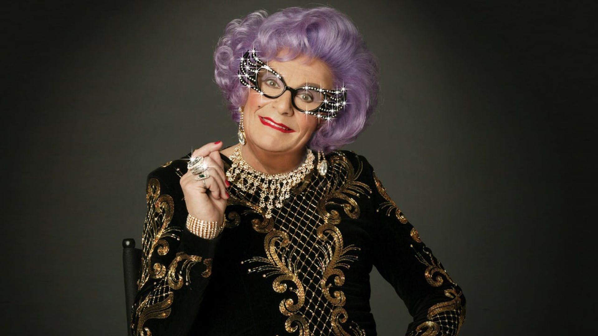 The Dame Edna Treatment background