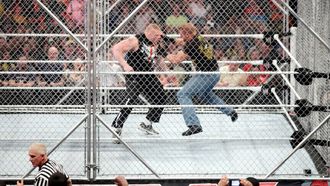 Episode 19 Triple H and Brock Lesnar brawl inside a Steel Cage